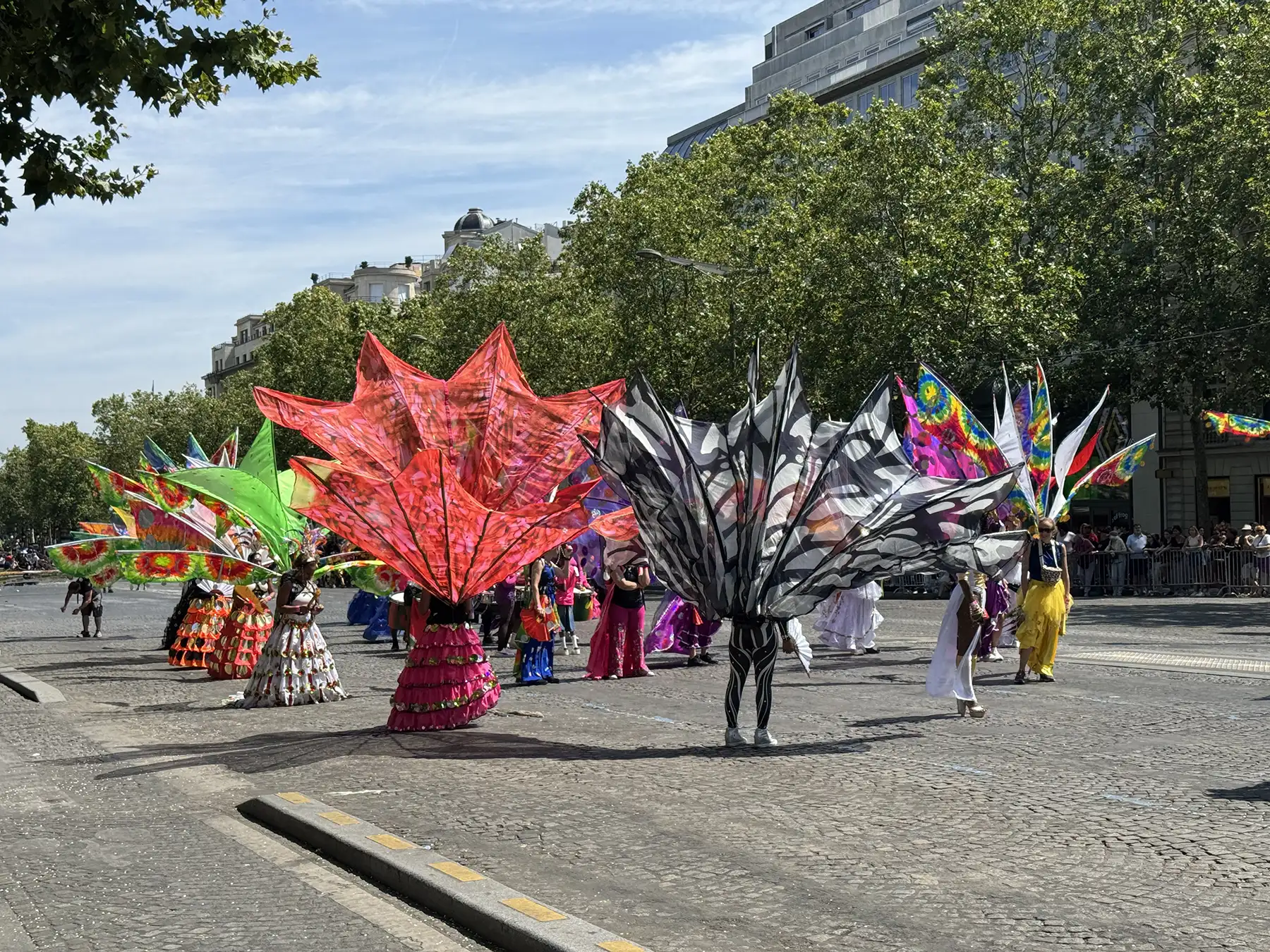 Carnaval Tropical de Paris giant costumes Carnaval Tropical de Paris: What to Expect at the Free Parade on the Champs-Élysées